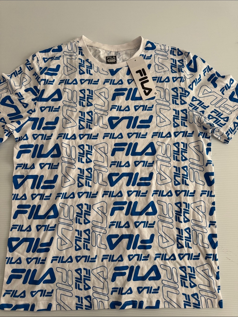 FILA White Short-Sleeve Tee with All-Over Blue Logo Print